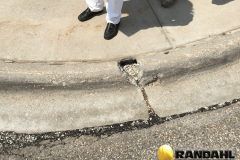 damage concrete curb